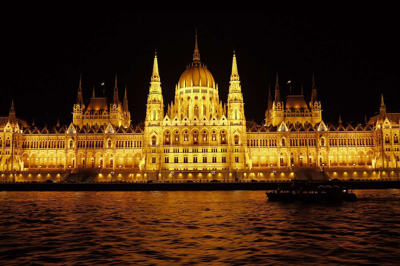 The Hungarian Parliament building on the Danube in Budapest, lit at night
